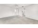 Bright bedroom features an en-suite bathroom and neutral colored carpet at 135 Heron Bay Cir, Lake Mary, FL 32746