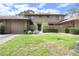 Charming townhome featuring well-kept lawn, updated paint, and fenced-in courtyard at 135 Heron Bay Cir, Lake Mary, FL 32746