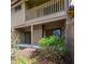 The exterior features a balcony on the second floor, patio access through sliding doors, and a fenced perimeter at 135 Heron Bay Cir, Lake Mary, FL 32746