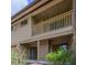 Charming condo exterior with a second story balcony, and sliding glass doors below for natural light at 135 Heron Bay Cir, Lake Mary, FL 32746