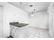 A minimalistic kitchen boasts ample storage and countertop space, with access to the breakfast nook at 135 Heron Bay Cir, Lake Mary, FL 32746