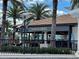 The community's inviting bar & grill features outdoor seating, perfect for enjoying a meal with a view at 144 Angelas Ave, Haines City, FL 33844