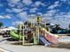 A colorful splash pad features playful water elements, offering a delightful experience for children on a sunny day at 144 Angelas Ave, Haines City, FL 33844