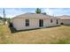 This home has a well-maintained lawn, providing a perfect outdoor retreat at 15 Sawfish Ln, Kissimmee, FL 34759