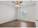 Bedroom with window and ceiling fan at 15 Sawfish Ln, Kissimmee, FL 34759