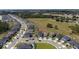 Beautiful aerial view of a suburban neighborhood with well-manicured lawns and neatly arranged houses at 16301 Sanctuary Reserve Loop, Clermont, FL 34714