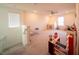 Spacious bonus room with natural light and plenty of room for activities at 16301 Sanctuary Reserve Loop, Clermont, FL 34714