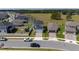Street view of a two-story home highlighting its well-maintained facade and landscaping at 16301 Sanctuary Reserve Loop, Clermont, FL 34714