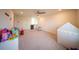 Spacious playroom with toys, a chalkboard, and a play tent at 16301 Sanctuary Reserve Loop, Clermont, FL 34714