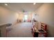 Bright playroom with plenty of space for activities and includes an overhead fan at 16301 Sanctuary Reserve Loop, Clermont, FL 34714