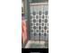 Bathroom featuring a patterned shower curtain and coordinated peach towels at 16500 Quarter Horse Ct, Montverde, FL 34756