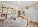 Comfortable bedroom with a bed, dresser, and plenty of storage, showcasing a serene retreat at 16500 Quarter Horse Ct, Montverde, FL 34756