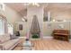 Stylish living room with a modern fireplace, hardwood floors, and comfortable seating offers a welcoming retreat at 16500 Quarter Horse Ct, Montverde, FL 34756
