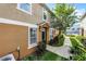 Exterior facade with landscaping and walkway leading to the front door at 1821 San Jacinto Cir, Sanford, FL 32771