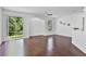 Bright living room with hardwood floors, a ceiling fan, and sliding glass doors at 1821 San Jacinto Cir, Sanford, FL 32771