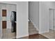 Carpeted stairs are adjacent to the kitchen, connecting different areas of the house at 1821 San Jacinto Cir, Sanford, FL 32771