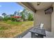 Relaxing back patio with a fire pit, outdoor seating, and a yard view complete with a Netflix-ready TV at 1898 9Th Ave, Deland, FL 32724
