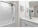Clean bathroom featuring a tub with shower, a vanity with sink, and neutral decor at 1898 9Th Ave, Deland, FL 32724