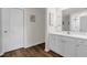 Well-lit bathroom featuring a white vanity with a modern countertop and stylish decorative accents at 1898 9Th Ave, Deland, FL 32724