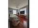 Cozy bedroom features a ceiling fan, laminate flooring, and natural light from the two windows at 204 Terrace Ridge Cir # 204, Davenport, FL 33896