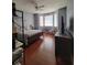 Serene bedroom with hardwood floors, a ceiling fan, and plenty of natural light at 204 Terrace Ridge Cir # 204, Davenport, FL 33896