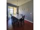 Cozy dining area with a view to the balcony, perfect for Gathering meals and entertaining guests at 204 Terrace Ridge Cir # 204, Davenport, FL 33896