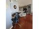 Comfortable home office space with hardwood floors, built-in desk, and modern lighting at 204 Terrace Ridge Cir # 204, Davenport, FL 33896