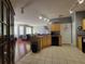 Bright kitchen with tiled floors and a view to the living area, creating an inviting and functional space at 204 Terrace Ridge Cir # 204, Davenport, FL 33896