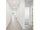 Hallway with hard surface floors leading to additional rooms at 2141 Rosewood Dr, Bartow, FL 33830