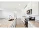 Bright, open-concept kitchen boasts an island, stainless steel appliances, and ample counter space at 2141 Rosewood Dr, Bartow, FL 33830