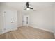 Bright bedroom with wood floors and a ceiling fan at 2327 Fieldingwood Rd, Maitland, FL 32751