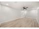Spacious bedroom with wood floors and a ceiling fan at 2327 Fieldingwood Rd, Maitland, FL 32751