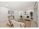 Comfortable living room featuring neutral toned furniture and ample seating at 2327 Fieldingwood Rd, Maitland, FL 32751