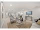 Bright living room featuring wood floors and stylish furnishings at 2327 Fieldingwood Rd, Maitland, FL 32751