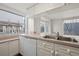 Kitchen area featuring laminate countertops and white appliances at 242 Coco Plum Dr, Davenport, FL 33897