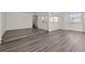 Spacious open layout with wood floors, neutral colors, and lots of light at 242 Coco Plum Dr, Davenport, FL 33897