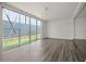 Open concept living area with sliding glass doors to a small fenced yard at 242 Coco Plum Dr, Davenport, FL 33897