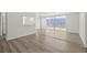 Open concept living room with sliding glass doors to the backyard at 242 Coco Plum Dr, Davenport, FL 33897
