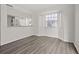 Sunlit living room with an open floor plan and a large window at 242 Coco Plum Dr, Davenport, FL 33897