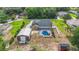 This property has a screened pool, a detached garage, and a lush, private backyard at 2420 Heron Ct, St Cloud, FL 34769