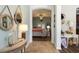 Inviting entryway with decorative mirrors and a glimpse into the living area at 2420 Heron Ct, St Cloud, FL 34769