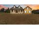 Charming two-story home with a welcoming front porch and meticulously maintained lawn at 2420 Heron Ct, St Cloud, FL 34769