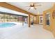 Outdoor living space featuring a covered patio and a beautiful pool, ideal for entertaining at 2420 Heron Ct, St Cloud, FL 34769