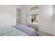 This bright bedroom has a beautiful view from its large window and stylish design at 2423 Datura Loop, St Cloud, FL 34772