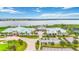 Beautiful lakefront clubhouse with ample parking and lush landscaping creates a welcoming atmosphere at 2423 Datura Loop, St Cloud, FL 34772
