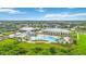 Stunning resort-style pool, surrounded by lush greenery and comfortable lounge chairs, perfect for relaxation at 2423 Datura Loop, St Cloud, FL 34772