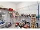 Spacious walk-in closet with ample shelving, offering plenty of storage space for organizing items at 2423 Datura Loop, St Cloud, FL 34772
