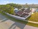 Aerial view of the backyard with a fence and view of the neighborhood and city skyline at 2504 London Bridge Ct, Orlando, FL 32837