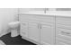Well-lit bathroom featuring a new vanity with modern fixtures and storage at 2504 London Bridge Ct, Orlando, FL 32837