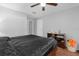Cozy bedroom with dark furniture and neutral walls at 2504 London Bridge Ct, Orlando, FL 32837